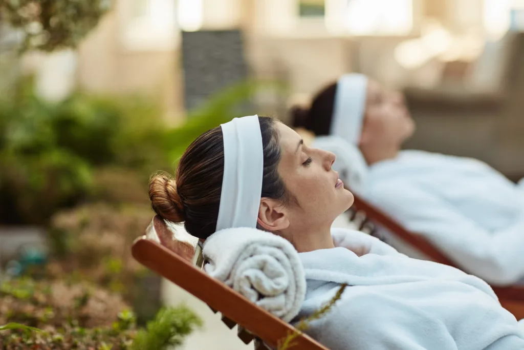 benefits of wellness tourism two women at spa relaxing